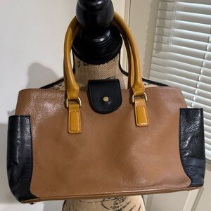 Vintage Talbots Tri Color (Cognac brown, black and mustard) purse




Panzdeh